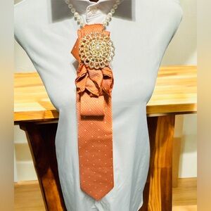 Elegant Orange Necktie with Gold/Pearl Brooch